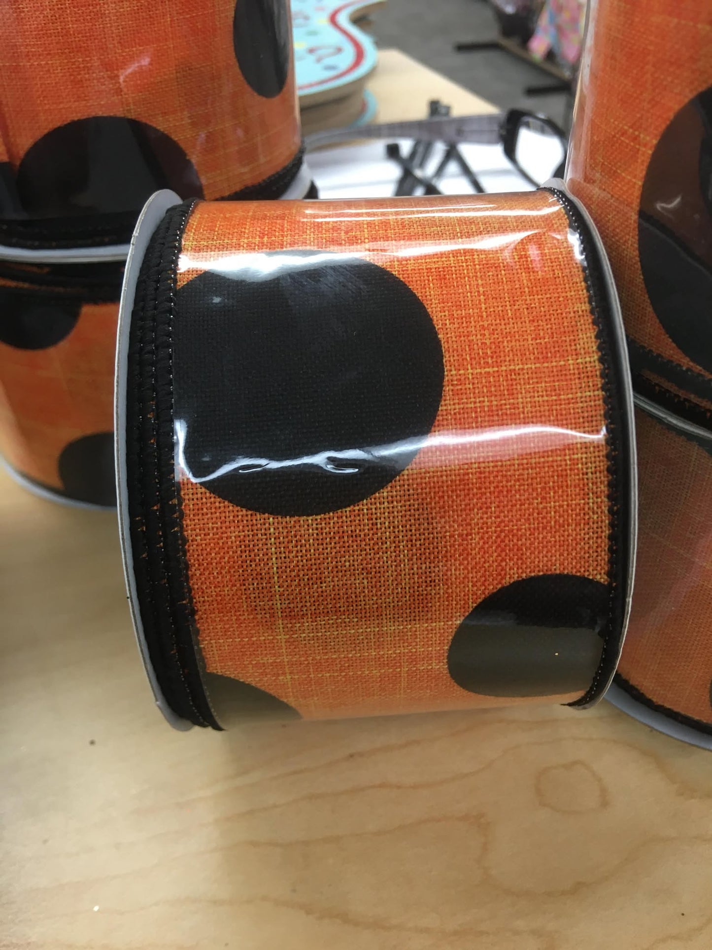 RGA104220 2.5"x10yds Large Polka Dot Black/Orange