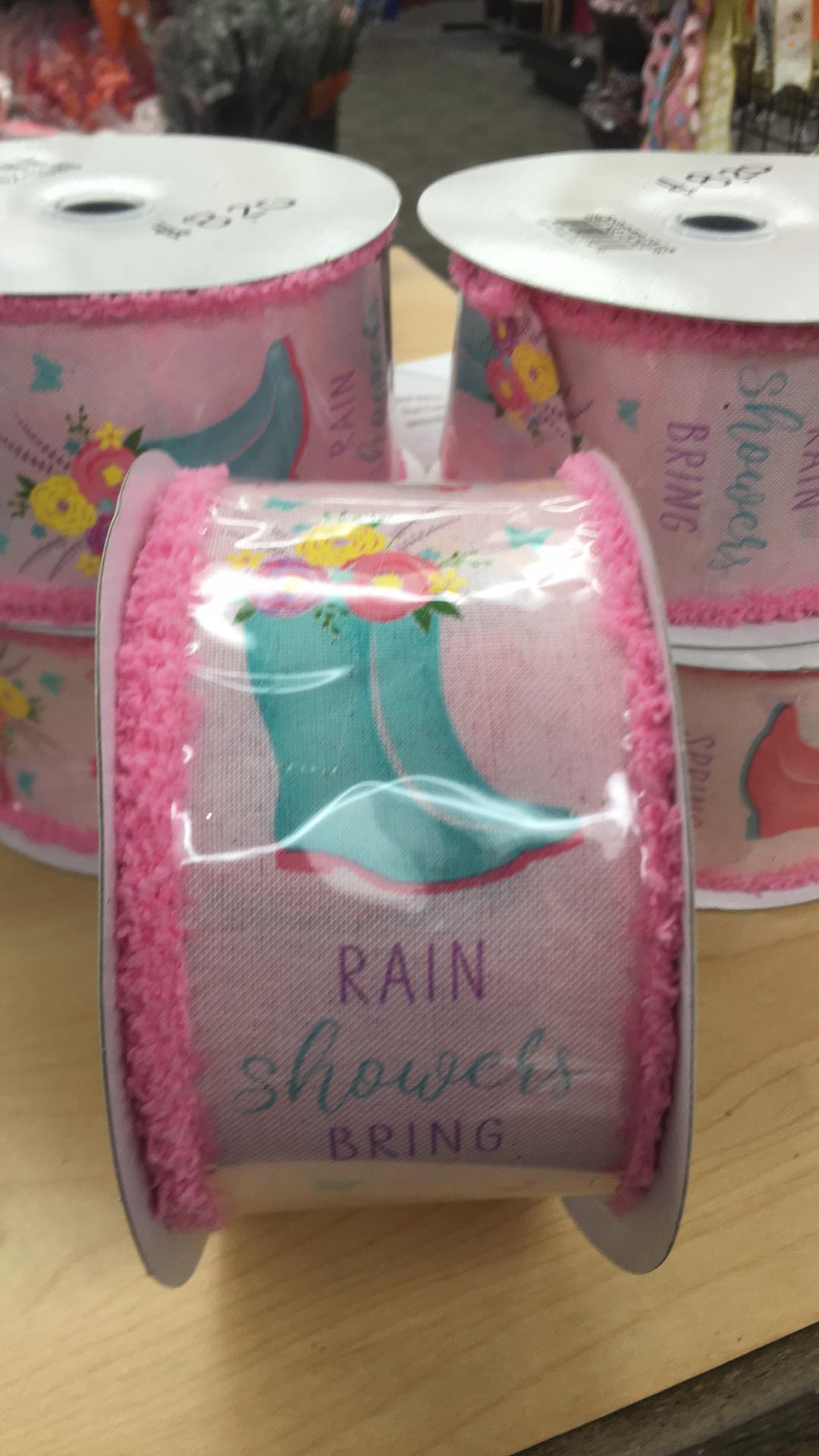RG0897515 2.5" x 10yd Rainboots On Royal W/Drift Pnk/Teal/Blu/Ylw/Lav/Grn