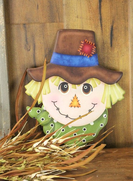 MD062405  12"H X 10"L Metal cb B Scarecrow with Green Scarf Brown/Green/Blue