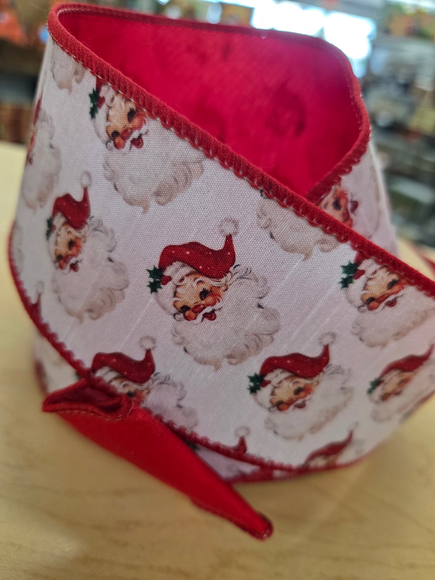 8111W-250-63E     2 1/2"10Yds   Reversible Dupioni | Santa Face         Red/White and Red Backing
