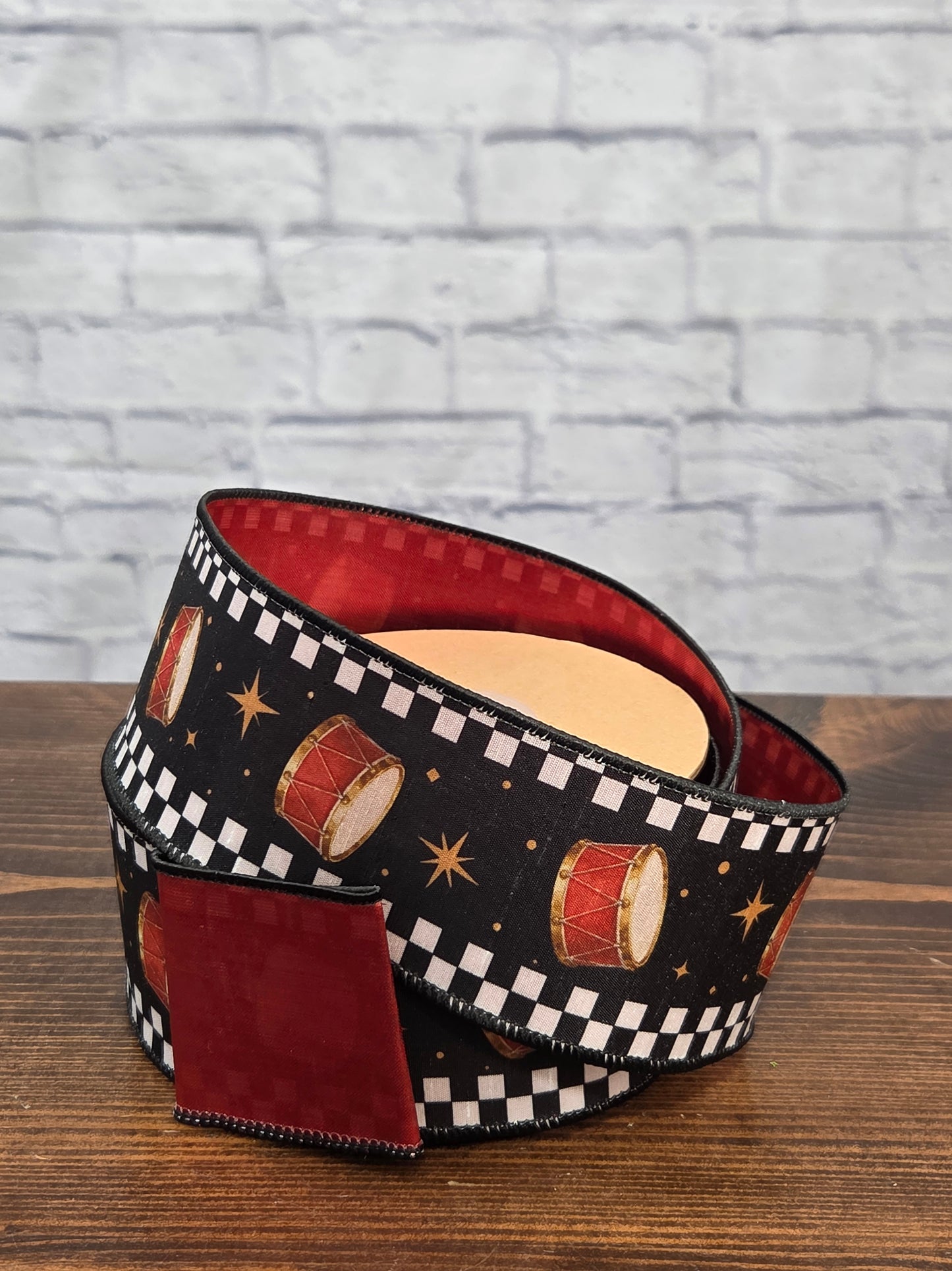 9810W-030-63E     2 1/2" Wired Dupioni Ribbon | Black/White Check Drums on Black w/ Red Backing | 10 Yard Roll